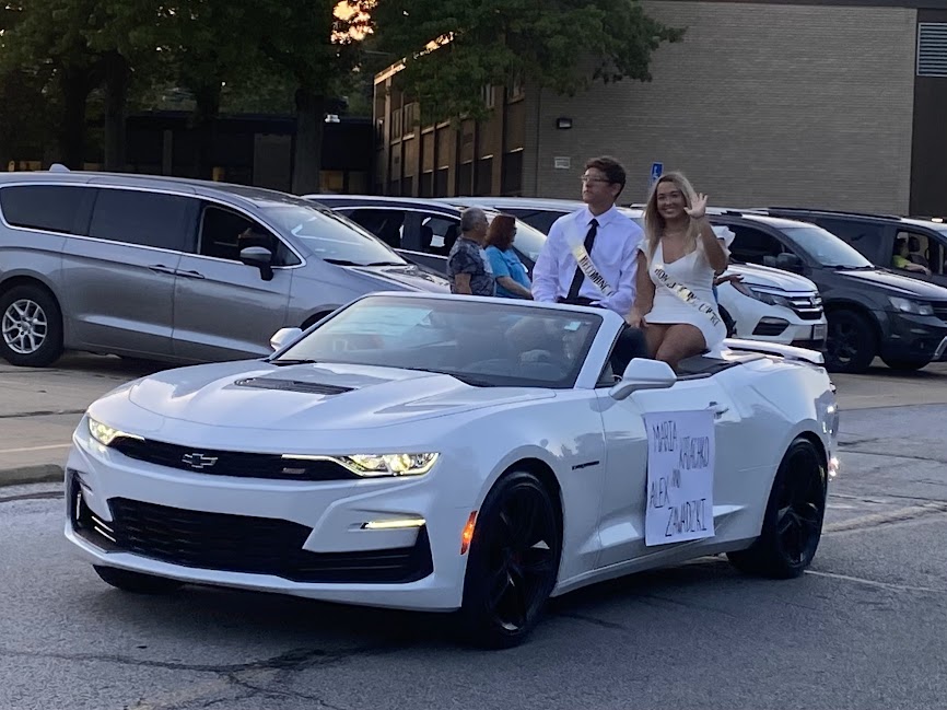 Maria Kriachko and Aleks Cawadzki Homeocoming Court Members in Parade