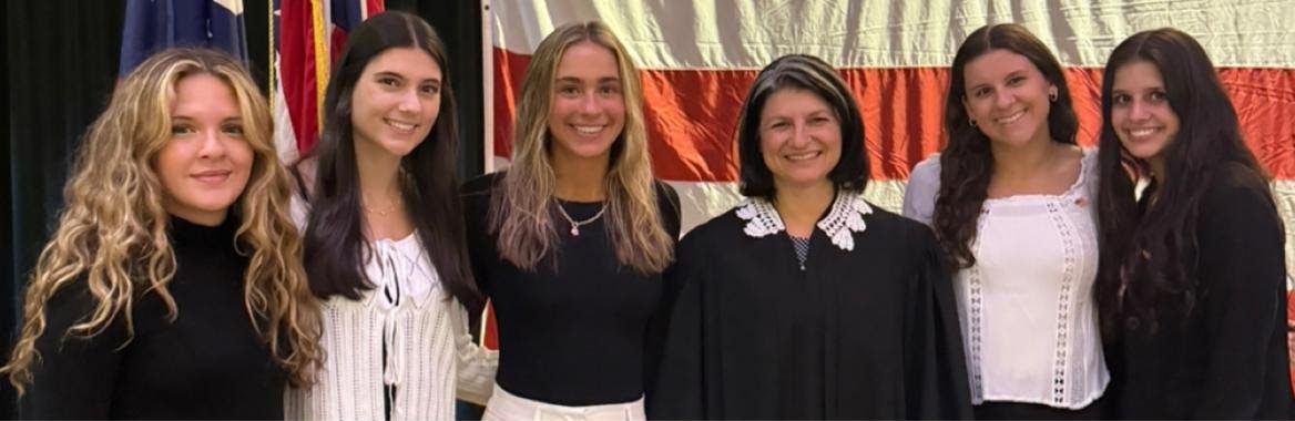 BBHHS Student Government, led by Jonah Pichette, hosted a naturalization ceremony on September 9. _________, Caitlin Mihalek, Alexa Ganley????, judge Suzanna Koch, and Rachel Kirin pose at the event together. (Kevin Jakub)