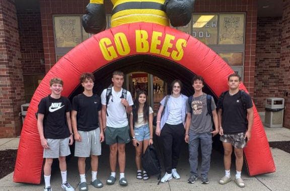 Staff members greet students as they enter the building on August 20. Freshmen Cole Gibbons, Efthemios Dolden, Milan Gusic, Evelyn Westgate, Kellan Draper, Everett Egan, and Mitchell Jacak begin a new chapter on their first day of high school. (Kevin Jakub)